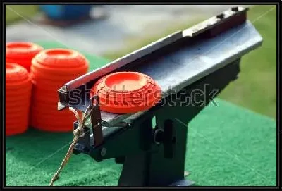 Картина Аппарат для запуска тарелочек в спортивной стрельбе