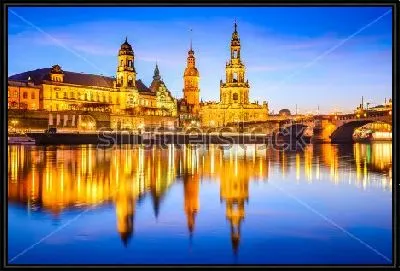 Закат на реке Эльбе с видом на Собор Святой Троицы в Дрездене