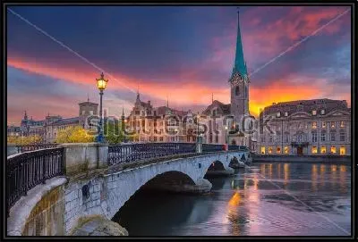 Картина Красивый закат над Цюрихом с видом на мост через реку Лиммат и собор Фраумюнстер в Старом городе