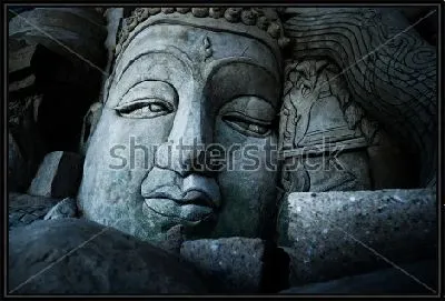 Грустное лицо Будды