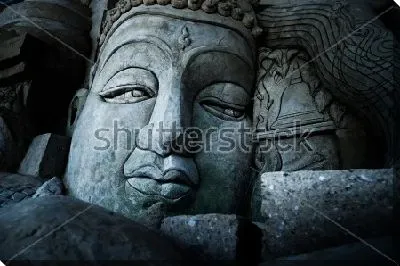 Грустное лицо Будды