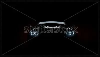 Картина Силуэт чёрного спортивного автомобиля с фарами на чёрном фоне