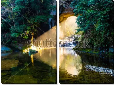 Модульная картина Луч света освещает вход в прекрасную пещеру с озером в Чибе (Япония)