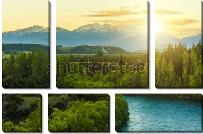 Фантастический пейзаж с восходом солнца над Южными Альпами и зелёными лесами в бассейне реки Клута (Новая Зеландия)