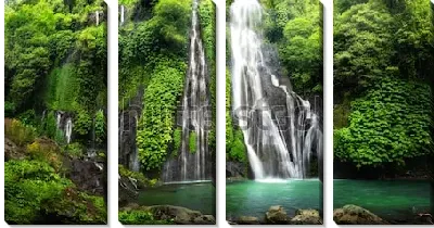 Модульная картина Каскадный водопад Баньюмала в тропическом лесу со скалами (Бали, Индонезия)