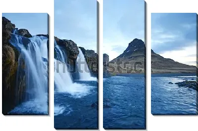 Потрясающие каскадные водопады на фоне величественной горы Киркьюфелл в Исландии