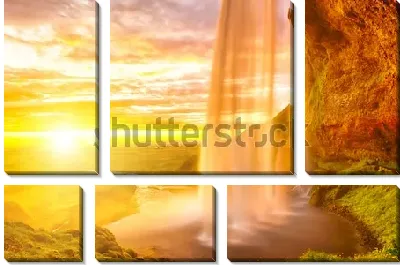 Модульная картина Фантастический пейзаж с «Парящим водопадом» Сельяландсфосс в лучах золотого заходящего солнца (Исландия)