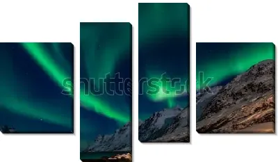 Удивительное северное сияние в снежных горах Северной Норвегии 