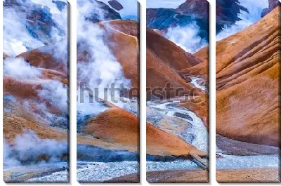 Фантастический пейзаж с дымящейся от горячих источников вулканической долиной Кедлингарфьёдль (Исландия)