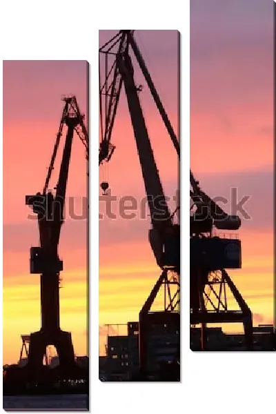 Модульная картина Силуэты кранов в гавани Гётеборга на фоне великолепного красочного заката (Швеция)