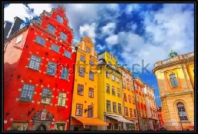 Картина Яркие разноцветные дома на фоне синего неба в историческом центре Стокгольма