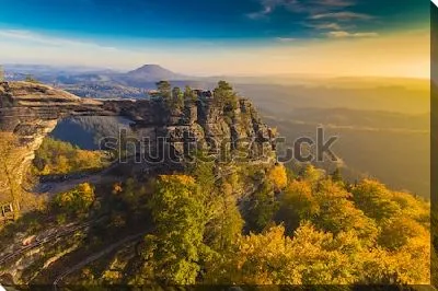 Постер Фантастический осенний пейзаж с Правчицкими воротами на восходе солнца (Чехия)