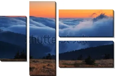 Модульная картина Облака над горными хребтами Есеники на фоне оранжевого закатного неба (Чехия)