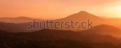 Плакат Великолепный оранжевый закат над горными хребтами в Чешской Швейцарии