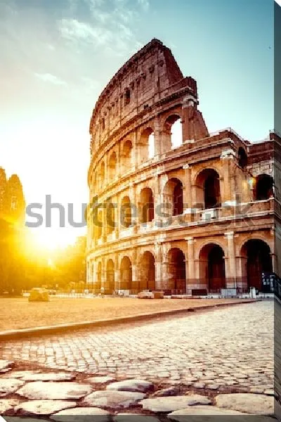 Постер Туристическая достопримечательность Рима - руины древнего Колизея в лучах закатного солнца
