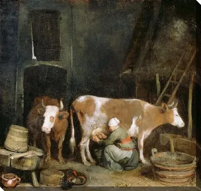 Служанка доит корову в сарае