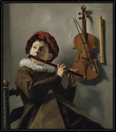 Мальчик играет на флейте