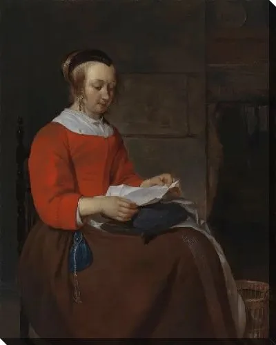 Картина Молодая женщина сидит в интерьере и читает письмо