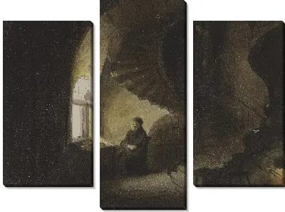 Человек сидит у окна