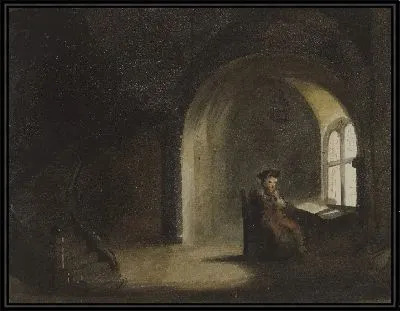 Человек сидит у окна