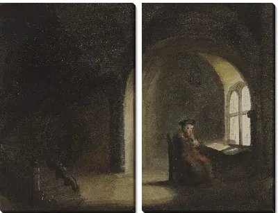 Человек сидит у окна