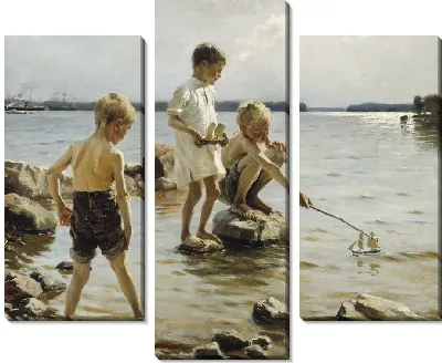 Мальчики играют на берегу