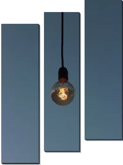 Модульная картина Лампа накаливания на синем фоне