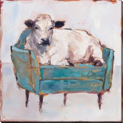Корова на диване