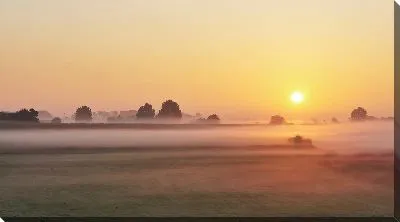 Солнце над туманной равниной