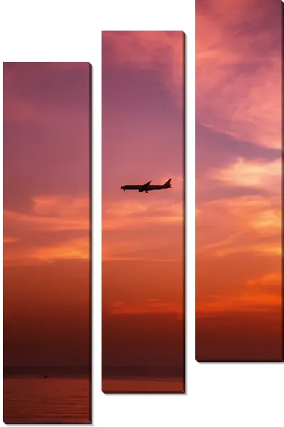 Модульная картина Самолет идет на посадку в лучах заката