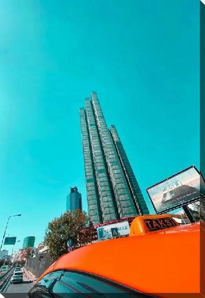 Постер Такси у небоскреба