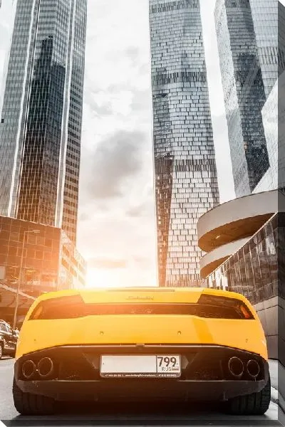 Постер Ламборгини на фоне небоскребов