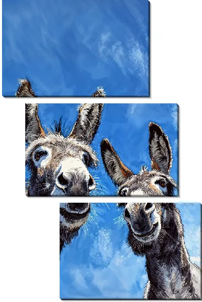Модульная картина Два осла смотрят в камеру на фоне голубого неба с облаками