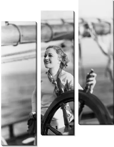 Модульная картина Девушка за рулем яхты (The girl behind the wheel of the yacht)