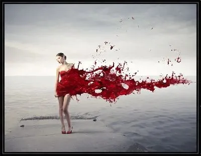 Девушка в платье из красных брызг
