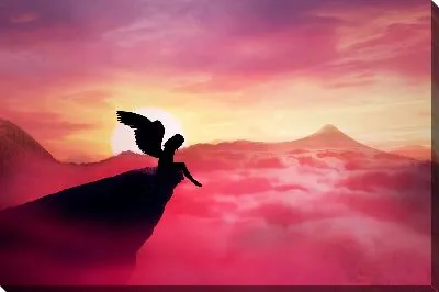 Женщина с крыльями на скале