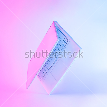 Картина Падающий белый ноутбук в красивом розово-голубом освещении 