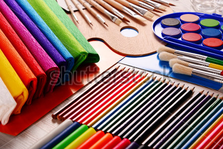 Картина Яркая геометрическая композиция с карандашами, красками, кисточками и цветной бумагой 