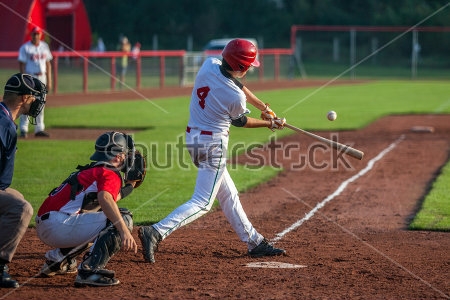 Картина Бейсболист бьёт по мячу 