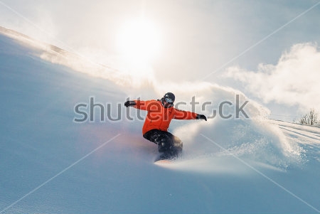 Картина Красивый спуск сноубордиста с высокой снежной горы 